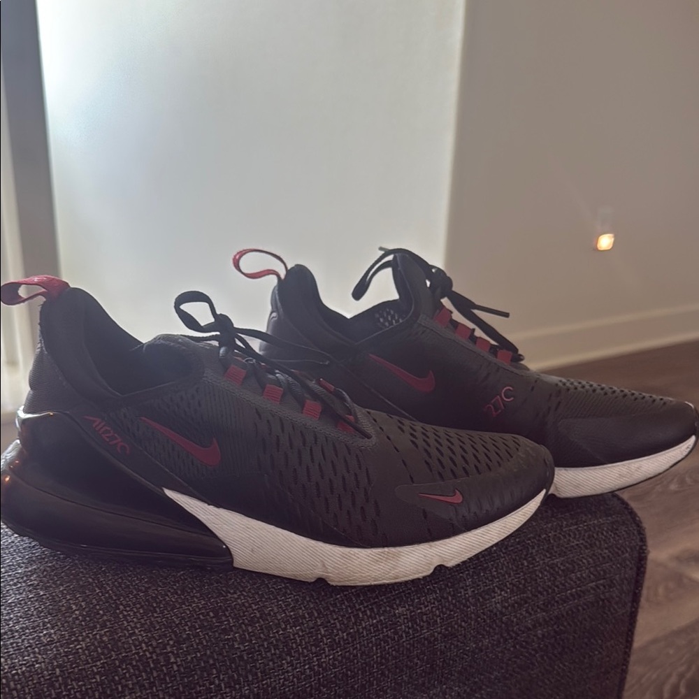 Nike Black and Red Athletic Shoes with Streamlined Silhouette